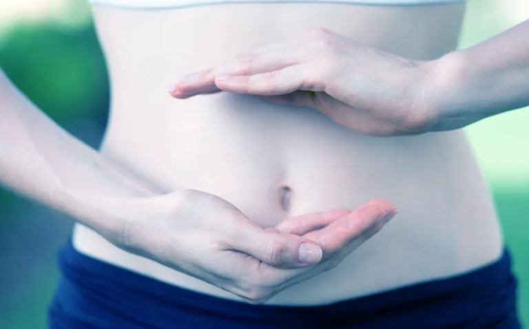 A close-up illustration of a human torso highlighting the digestive system, including the stomach and intestines. The image visually represents gut health, microbiome balance, and the connection between digestion and overall well-being.